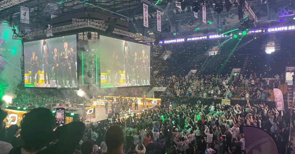 Packed arena celebrates 2025 CDL Champions with confetti, lights, and a giant screen showing the winning team.